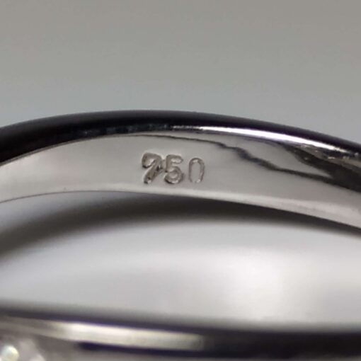 18k Diamond Swirl Ring marking