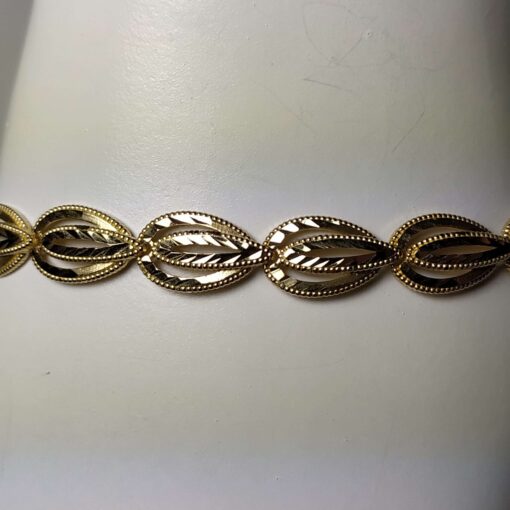 Add to wishlist Unique Diamond-Cut Yellow Gold Bracelet closeup