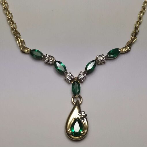 Emerald & Diamond Gold Necklace closeup