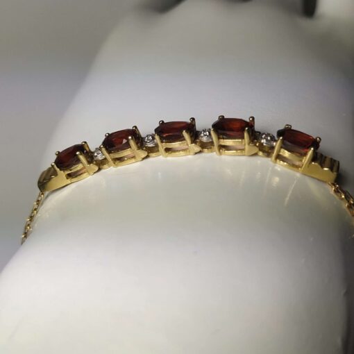 Garnet and Diamond Gold Bracelet side