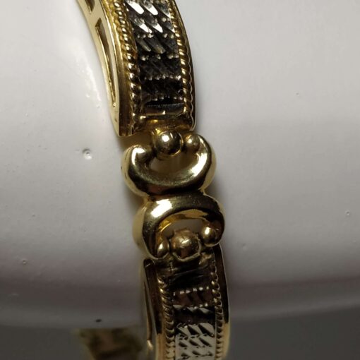 Two-Tone Diamond-Cut Gold Bracelet closeup
