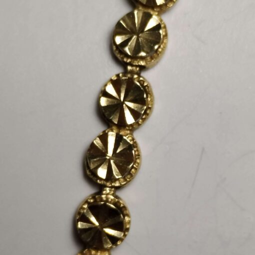 Yellow Gold Diamond-Cut Tennis Bracelet closeup