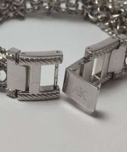 Anne Klein Women’s Stainless Steel Charm Bracelet Watch close up open clasp