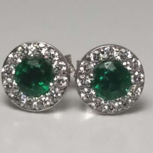 Emerald and Diamond Halo Stud White gold Earrings close up view