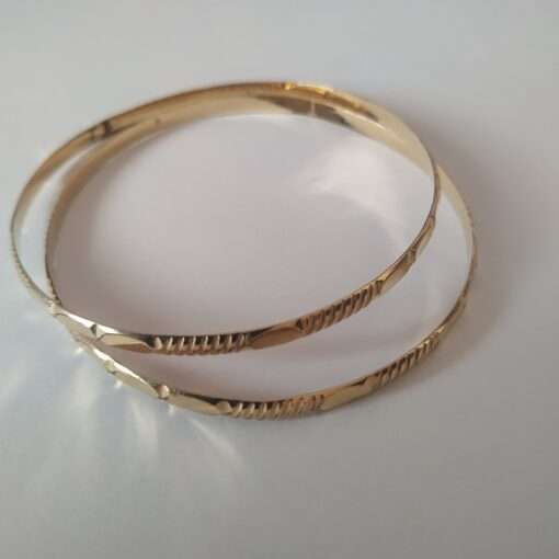 Pair of Solid Gold Bangle Bracelets side