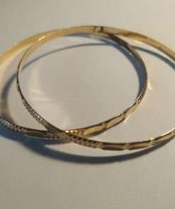 Pair of Solid Gold Bangle Bracelets close up
