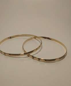 Pair of Solid Gold Bangle Bracelets front view