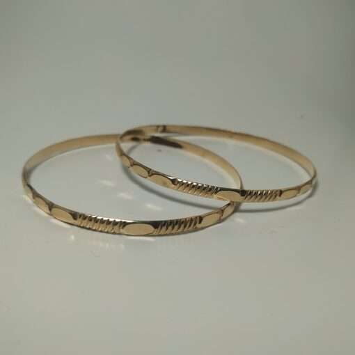 Pair of Solid Gold Bangle Bracelets front